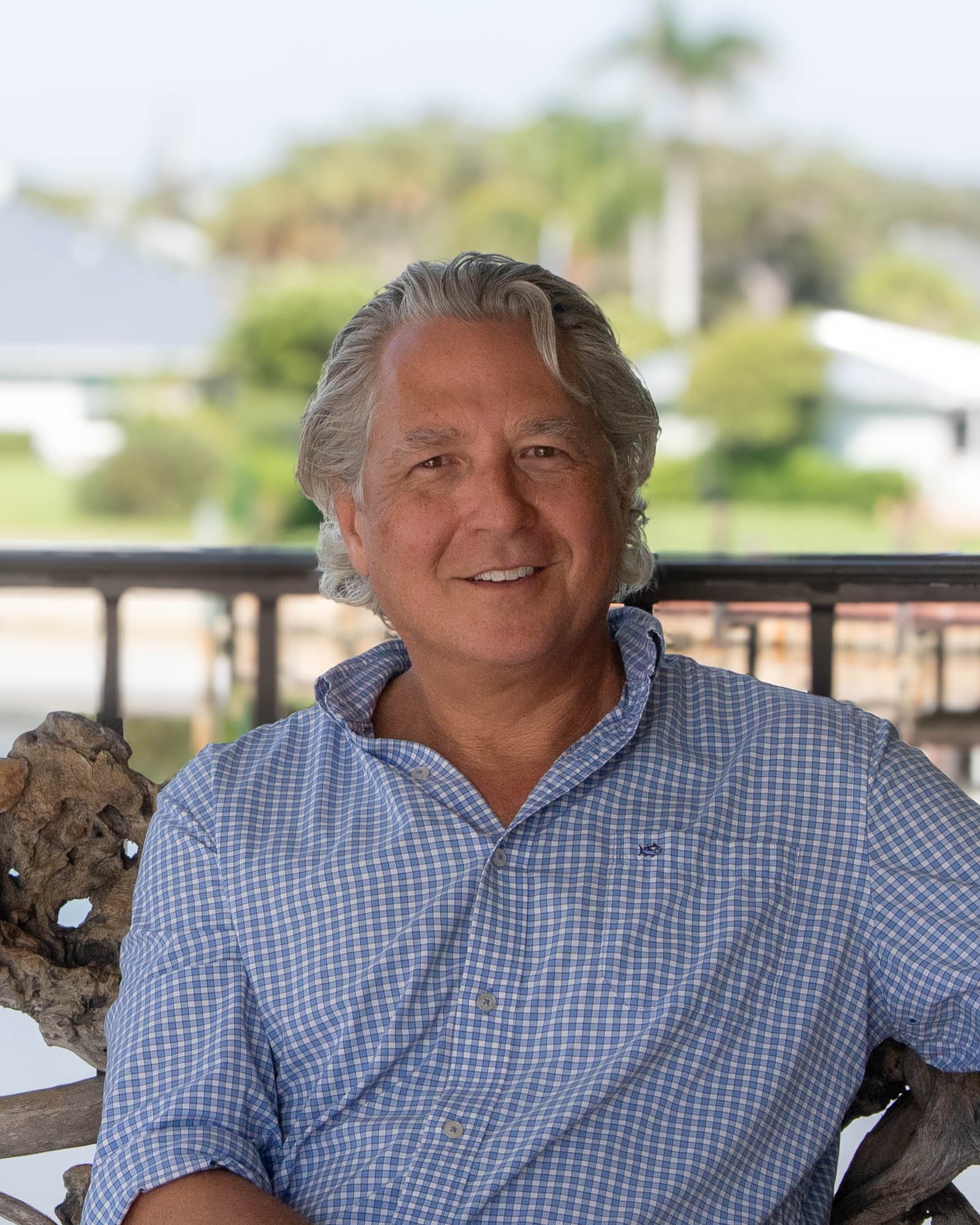 Robert Masseau, President of Builders East, at the water in Vero Beach, Florida